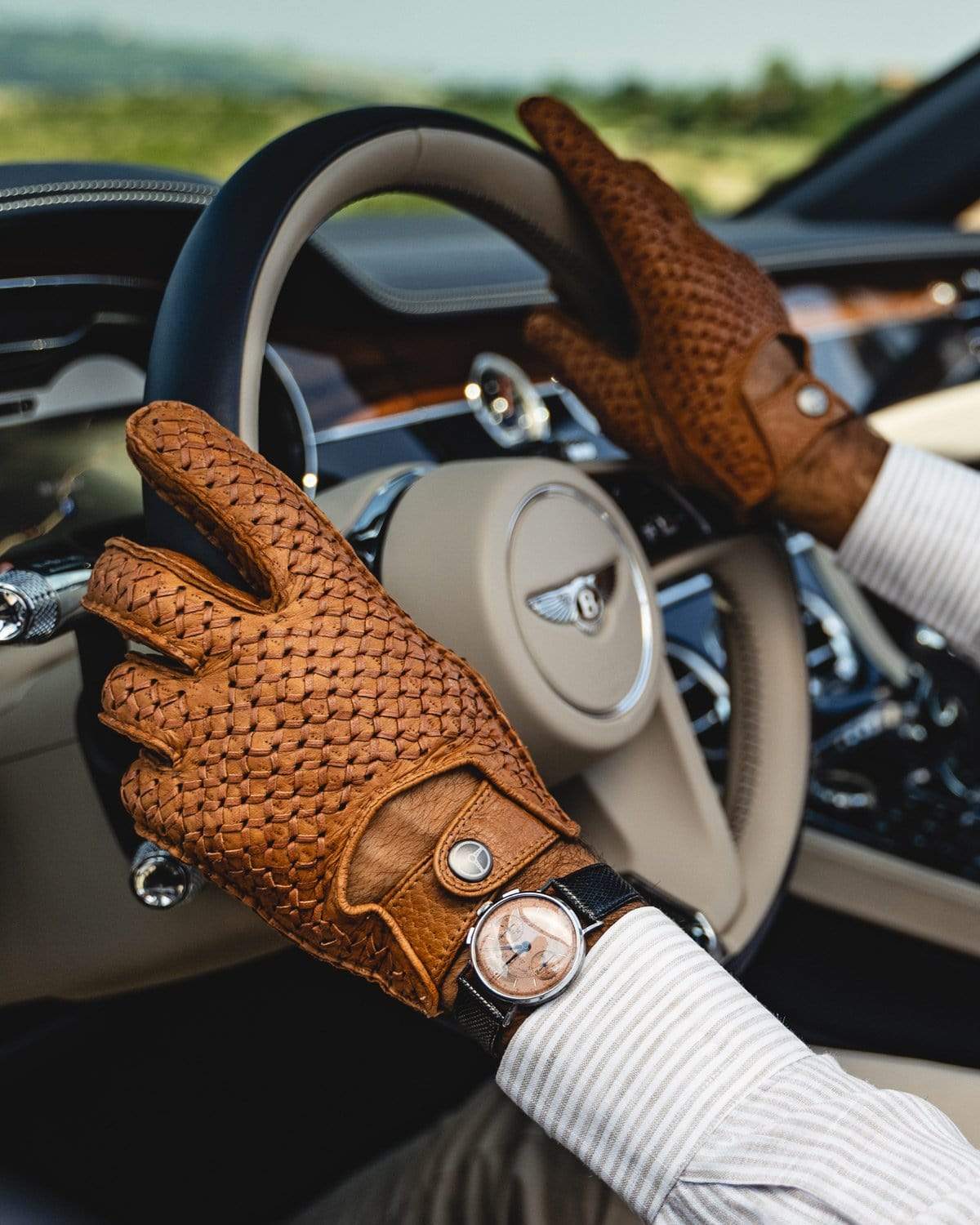 https://www.theoutlierman.com/cdn/shop/products/the-outlierman-gloves-bespoke-peccary-leather-driving-gloves-cork-tan-14859929649240.jpg?v=1603106243